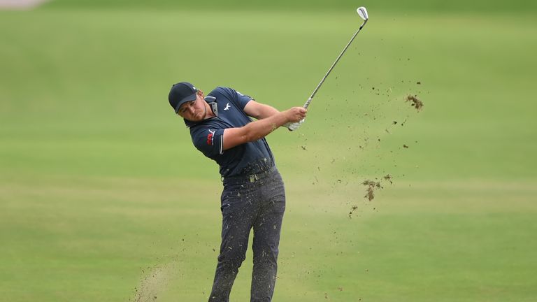 DOHA, QATAR - FEBRUARY 24:  Eddie Pepperell of England hits an approach shotp on the 7th hole during the third round of the Commercial Bank Qatar Masters a