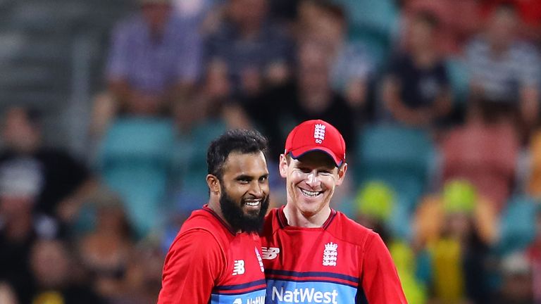HOBART, AUSTRALIA - FEBRUARY 07:  Adil Rashid of England celebrates with Eoin Morgan of England after taking the wicket of D'Arcy Short of Australia during