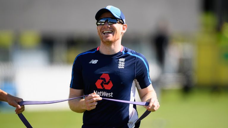 HAMILTON, NEW ZEALAND - FEBRUARY 16:  England captain Eoin Morgan shares a joke during England cricket nets at Seddon park on February 16, 2018 in Hamilton