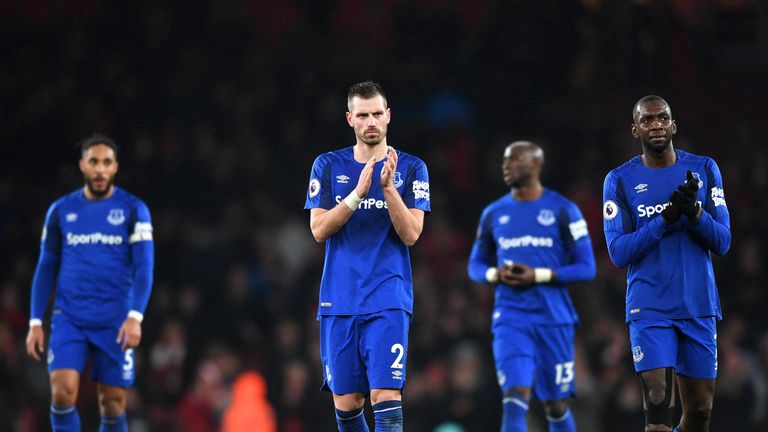 Everton players commiserate with their fans after the 5-1 loss at Arsenal
