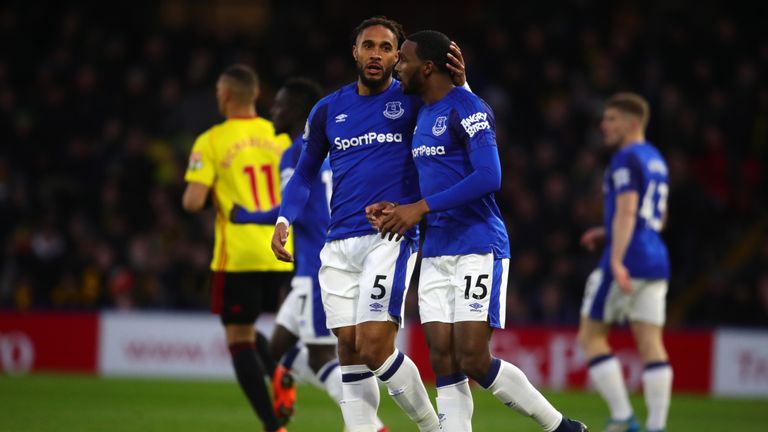 Ashley Williams and Cuco Martina of Everton speak during the Premier League match between Watford and Everton
