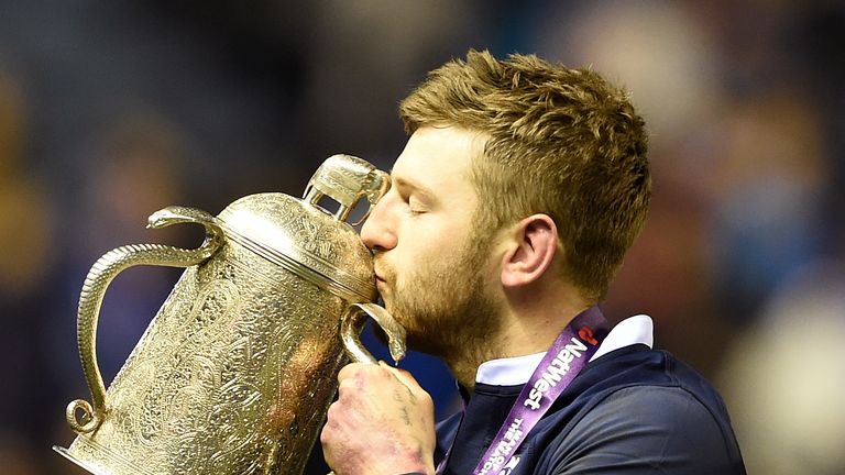  Finn Russell celebrates with the Calcutta Cup 