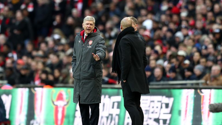 Arsene Wenger and Pep Guardiola exchange words during the Carabao Cup Final
