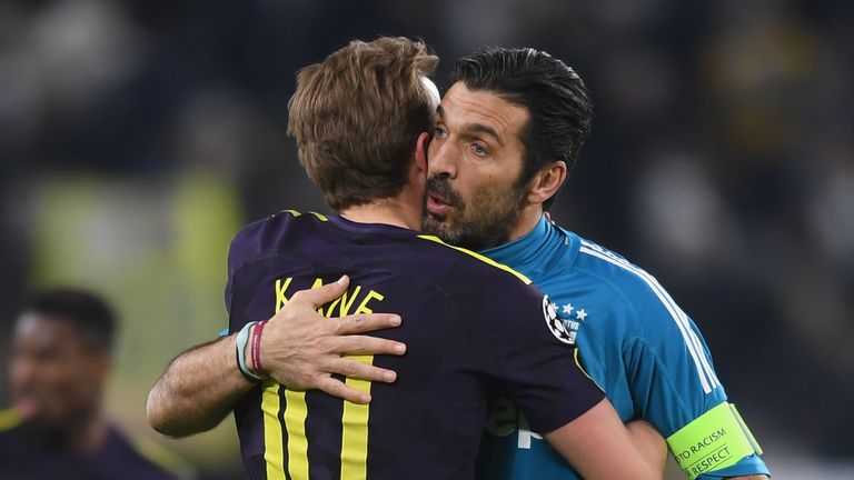 Harry Kane embraces Gianluigi Buffon after the UEFA Champions League Round of 16 First Leg between Juventus and Tottenham Hotpsur