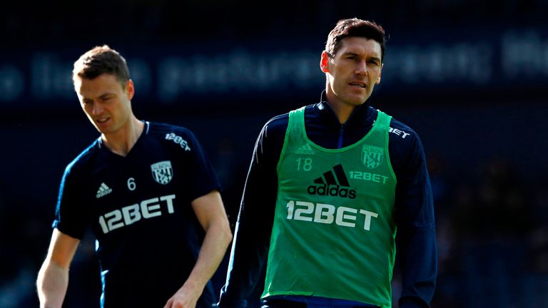 West Brom's Gareth Barry (right) and Jonny Evans