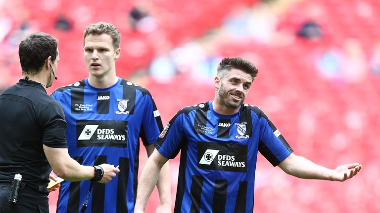 Liam Davis and Marc Cooper of Cleethorpes Town look on prior to referee Darren England booking Davis during The FA Vase final at Wembley, May 2017