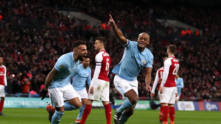 Vincent Kompany celebrates after scoring Manchester City's second goal during the Carabao Cup Final