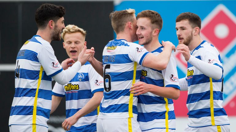 Morton's Frank Ross (2ndR) celebrates his goal with team-mates