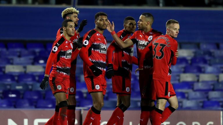 Steve Mounie of Huddersfield Town celebrates with team-mates after scoring his side's second goal during The Emirates FA Cup tie at Birmingham