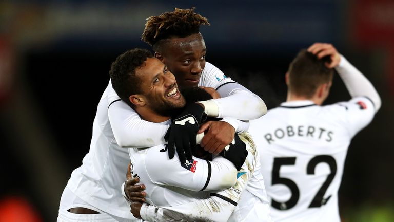 Wayne Routledge celebrates scoring the 6th Swansea goal with Tammy Abraham during The Emirates FA Cup Fourth Round replay v Notts County