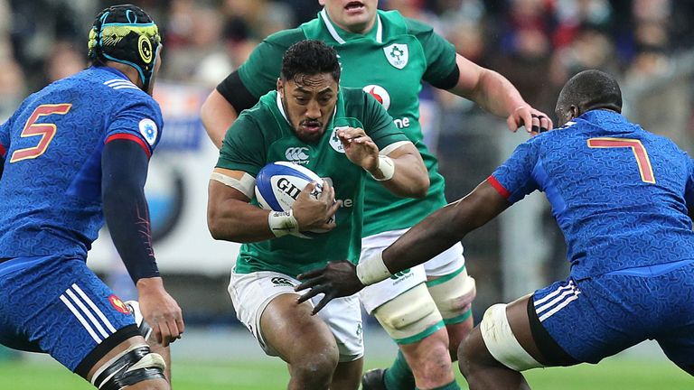 Ireland's Bundee Aki (centre left) in action during the NatWest 6 Nations match v France at the Stade de France, Paris