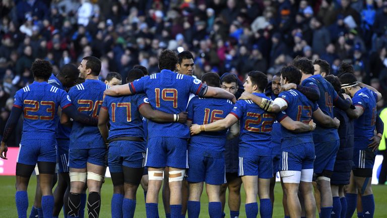 France's players huddle after the Six Nations international rugby union match between Scotland and France at Murrayfield Stadium in Edinburgh on February 1