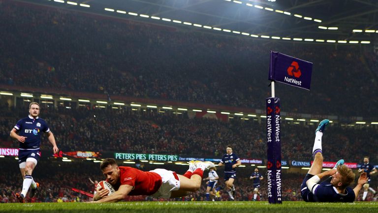 Gareth Davies dives to scores Wales first try against Scotland
