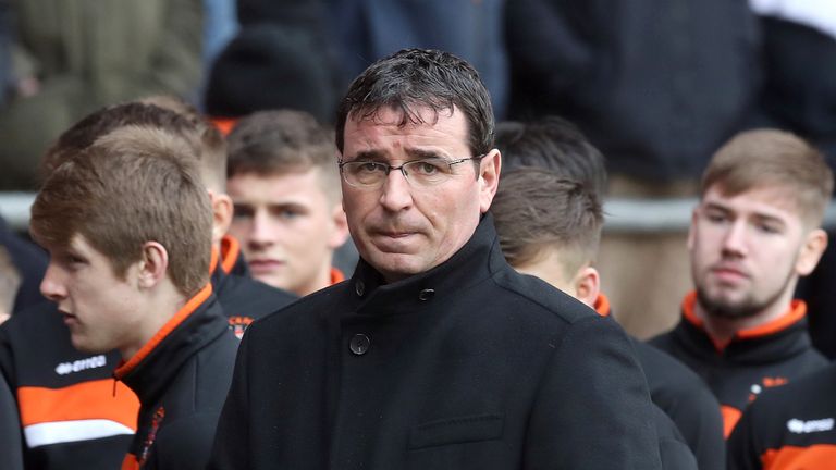 Blackpool Manager Gary Bowyer attends a memorial service for Jimmy Armfield as the funeral cortege for passes through Bloomfield Road