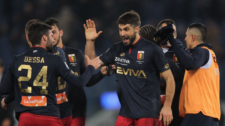 ROME, ITALY - FEBRUARY 05:  Luca Rossettini #13 with his teammates of Genoa celebrate the victory after the Serie A match between SS Lazio and Genoa at Sta