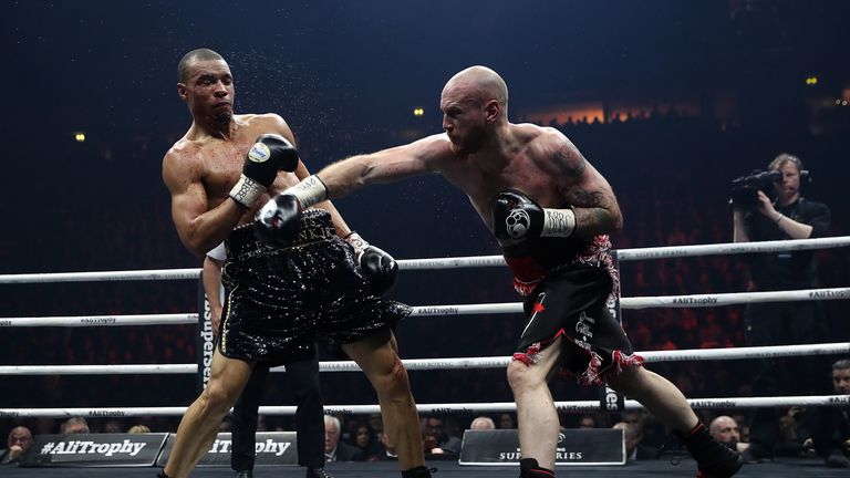 MANCHESTER, ENGLAND - FEBRUARY 17:  George Groves of England lands a punch on Chris Eubank JR of England during their WBSS Super Middleweight bout at the M