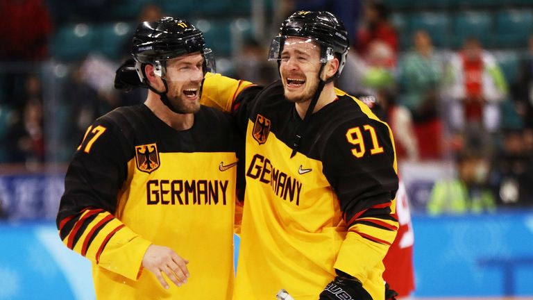 Germany celebrates after defeating Canada 4 to 3 in the  Men's Semifinals  