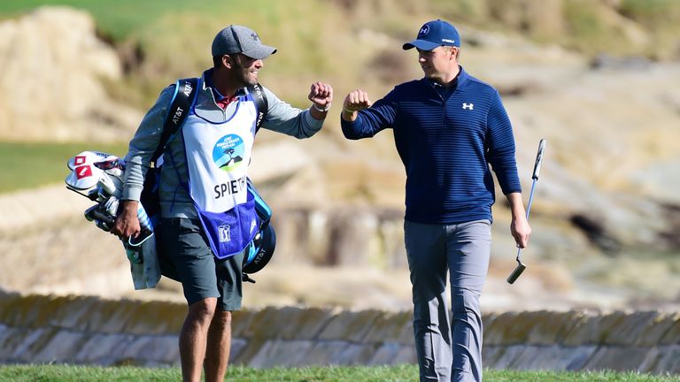 PEBBLE BEACH, CA - FEBRUARY 12:  Jordan Spieth celebrates with his caddie on the 18th hole during the final round of the AT&T Pebble Beach Pro-Am at Pebble