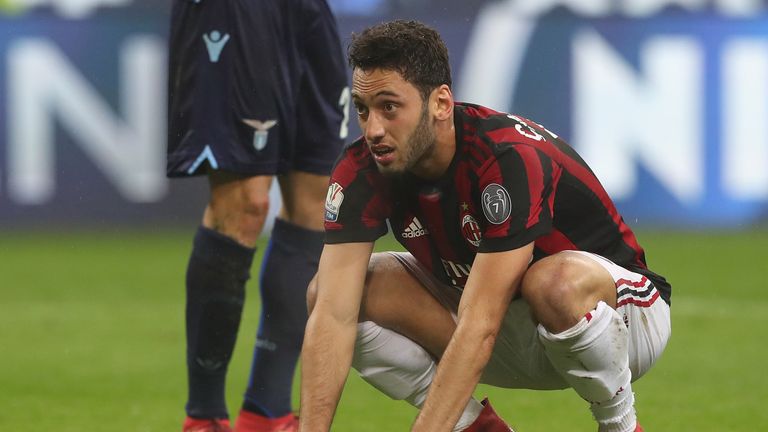 MILAN, ITALY - JANUARY 31:  Hakan Calhanoglu of AC Milan reacts to a missed chance during the TIM Cup match between AC Milan and SS Lazio at Stadio Giusepp