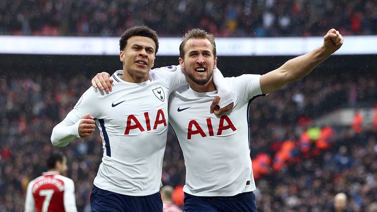 Harry Kane celebrates scoring his side's first goal of the game with Dele Alli