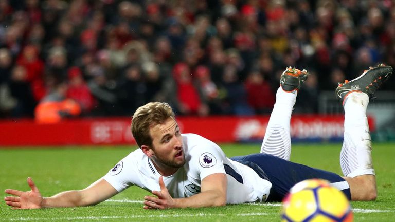 Harry Kane of Tottenham Hotspur reacts to being fouled in the penalty area during the Premier League match between Liverpool