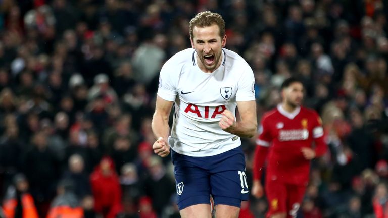 Harry Kane of Tottenham Hotspur celebrates after scoring his side's second goal and his 100th Premier League goal during the 2-2 draw at Liverpool