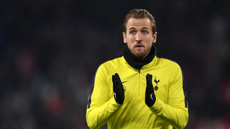 Harry Kane of Tottenham Hotspur shows appreciation to fane before the Champions League game with Juventus in Turin