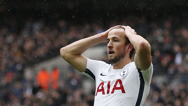 Tottenham Hotspur's English striker Harry Kane reacts after missing a chance during the English Premier League football match between Tottenham Hotspur and