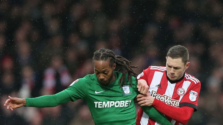 BRENTFORD, ENGLAND - FEBRUARY 10: Henrik Dalsgaard of Brentford tackles Daniel Johnson of Preston North End during the Sky Bet Championship match between B