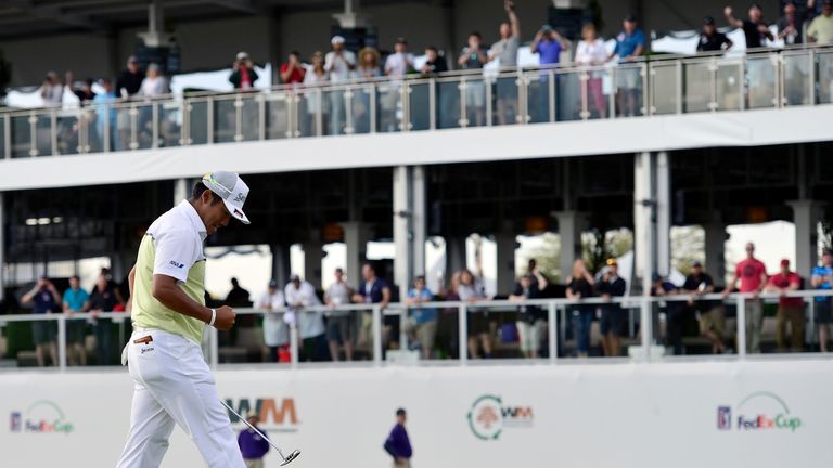 SCOTTSDALE, AZ - FEBRUARY 05:  Hideki Matsuyama of Japan reacts after making his birdie putt on the fourth playoff hole on the 17th green during the final 