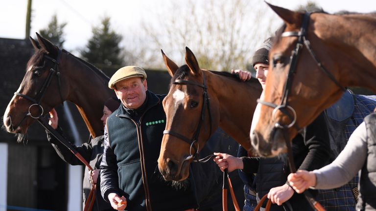 Nicky Henderson with three of his Betfair Hurdle team