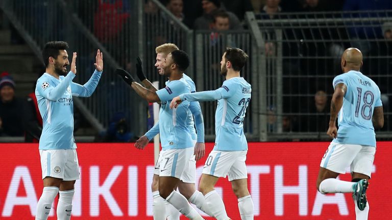 BASEL, BASEL-STADT - FEBRUARY 13: Ilkay Gundogan of Manchester City celebrates after scoring his sides first goal with his team mates during the UEFA Champ