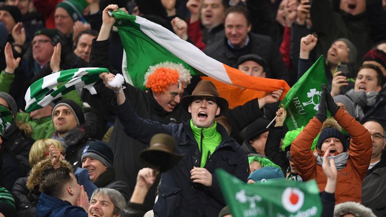 PARIS, FRANCE - FEBRUARY 03:  Irish fans celebrate at the end of the NatWest Six Nations match between France and Ireland at Stade de France on February 3,