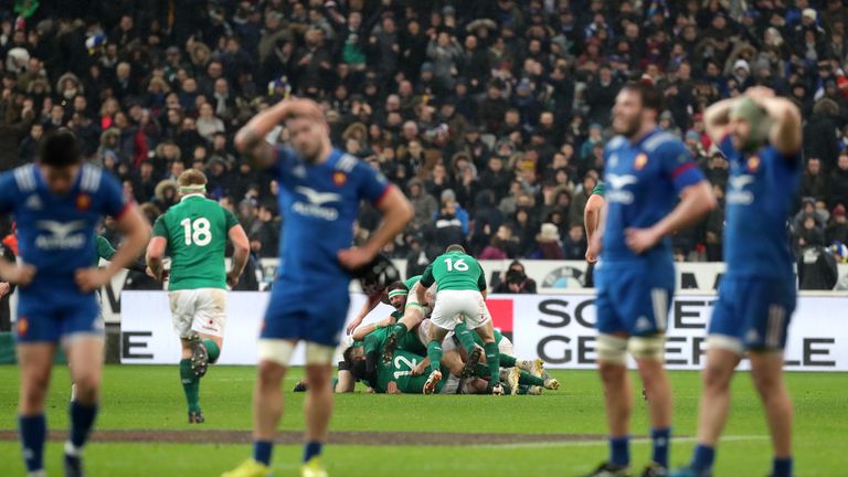 Ireland players celebrate after Johnny Sexton scores the winning drop goal during the NatWest 6 Nations match at the Stade de France, Paris.