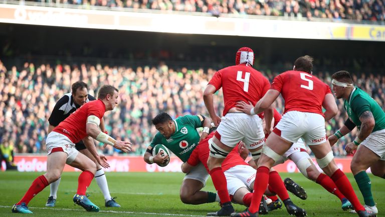 DUBLIN, IRELAND - FEBRUARY 24: Bundee Aki of Ireland scores a first half try during the NatWest Six Nations match between Ireland and Wales at Aviva Stadiu