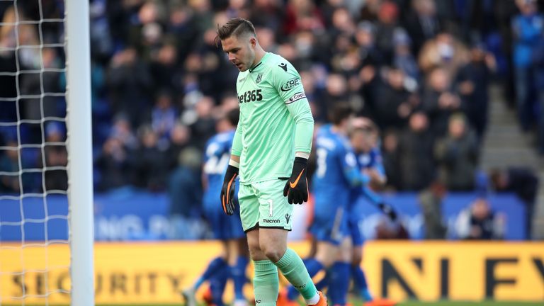 Jack Butland appears dejected after deflecting a Marc Albrighton cross into his own net