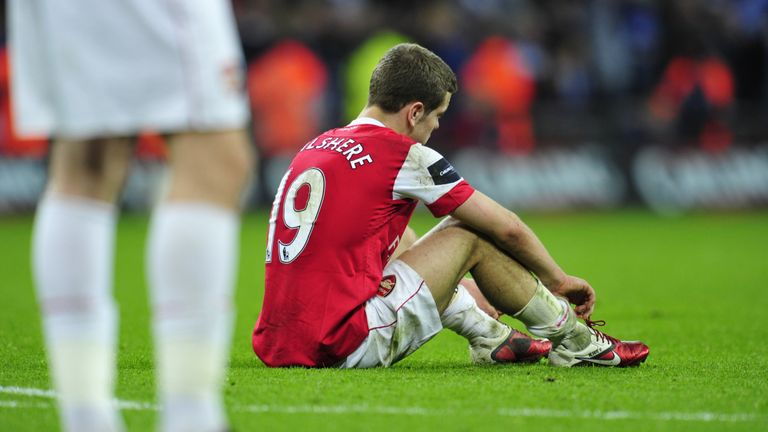 Arsenal's English midfielder Jack Wilshere looks dejected at the end of the Carling Cup final football match between Arsenal and Birmingham at the Wembley 