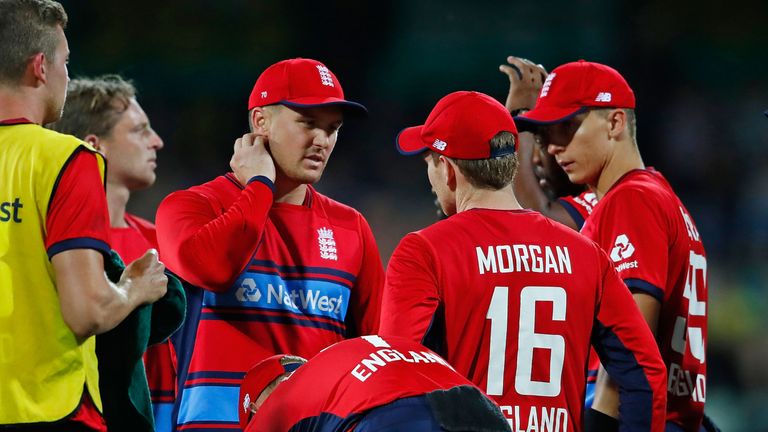 Jason Roy of England speaks with Eoin Morgan, captain of England after claiming a catch hit by Glenn Maxwell of Australia