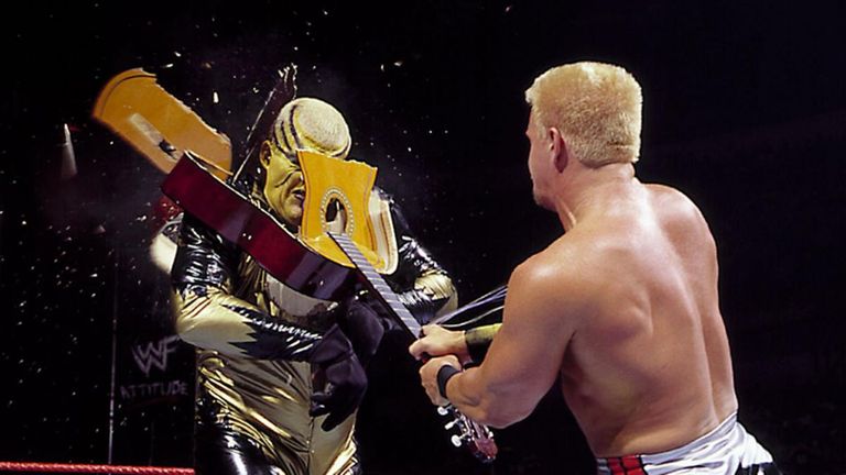 Jeff Jarrett - seen here breaking one of his guitars over the head of Goldust - will enter WWE's Hall of Fame this year