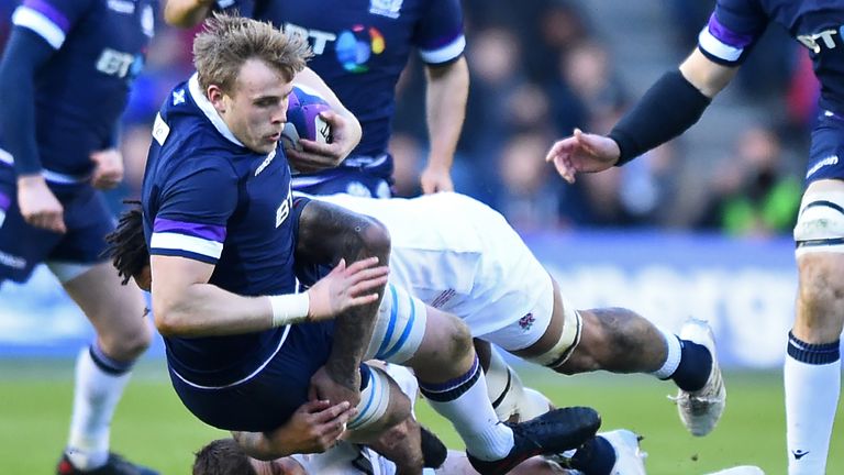 Scotland's lock Jonny Gray is tackled