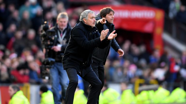 Jose Mourinho and Antonio Conte give their teams instructions during the Premier League match at Old Trafford