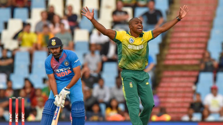 South Africa's Junior Dala (R) celebrates after a leg before wicket (LBW) decision to dismiss India's Rohit Sharma (L) during the second T20I cricket match