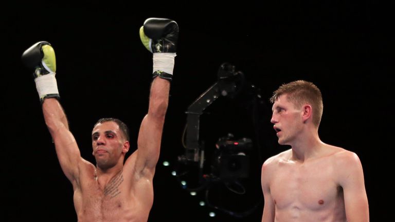 Kal Yafai (left) celebrates after the final bell as Jason Cunningham looks on during their British Super-Flyweight fight
