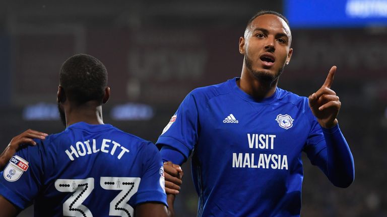 CARDIFF, WALES - SEPTEMBER 26:  Cardiff player Kenneth Zohore (r) celebrates his first goal with an assist from Junior Hoilett during the Sky Bet Champions
