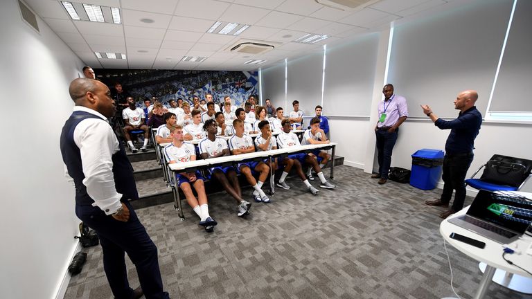 Chris Gibbons speaks to Chelsea players at the WONDERKID screening at Cobham