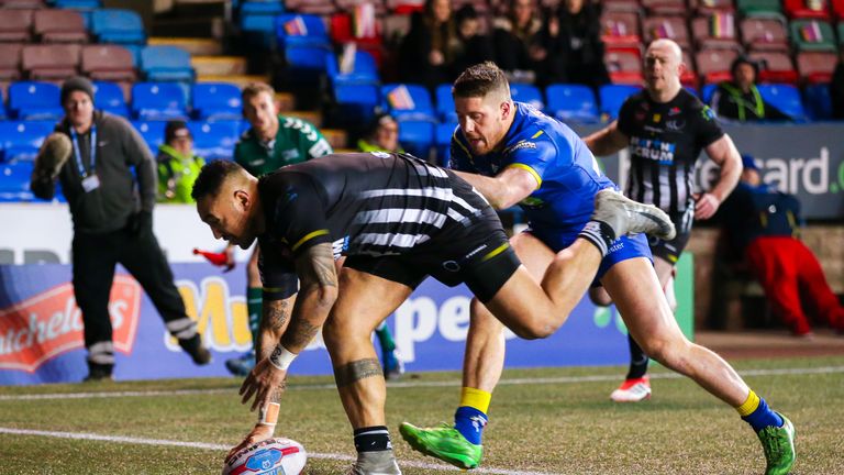 Warrington Wolves - Select Security Stadium, Widnes, England - Widnes' Krisnan Inu scores a try.