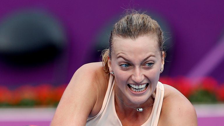 Petra Kvitova of the Czech Republic returns the ball to Agnieszka Radwanska of Poland (unseen), during their singles second match at the 2018 WTA Qatar Ope