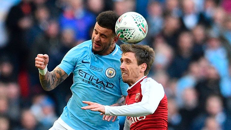 Kyle Walker and Nacho Monreal in action during the Carabao Cup final