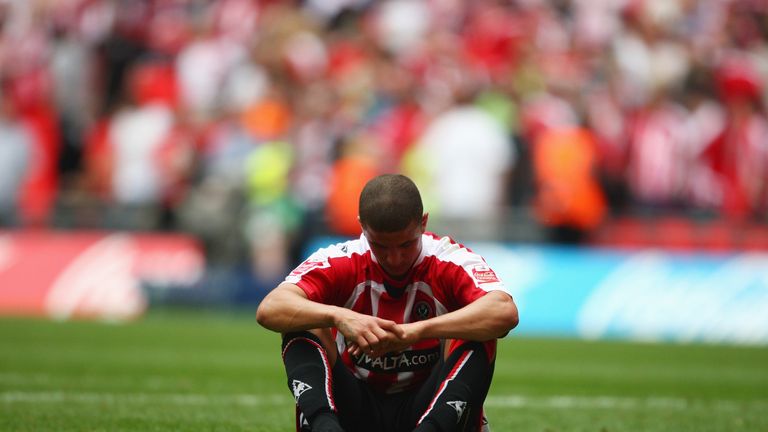 LONDON - MAY 25: Kyle Walker of Sheffield United sits dejected after the Coca-Cola Championship Playoff Final between Burnley and Sheffield United at Wembl