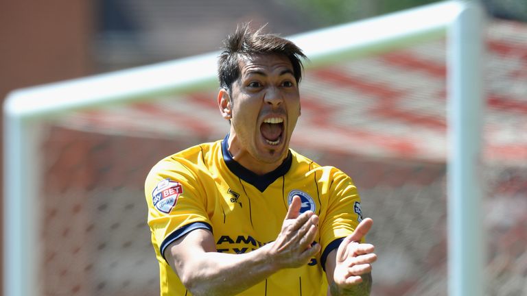 NOTTINGHAM, ENGLAND - MAY 03: Leonardo Ulloa of Brighton & Hove Albion disputes the linesman's offside call during the Sky Bet Championship match between N